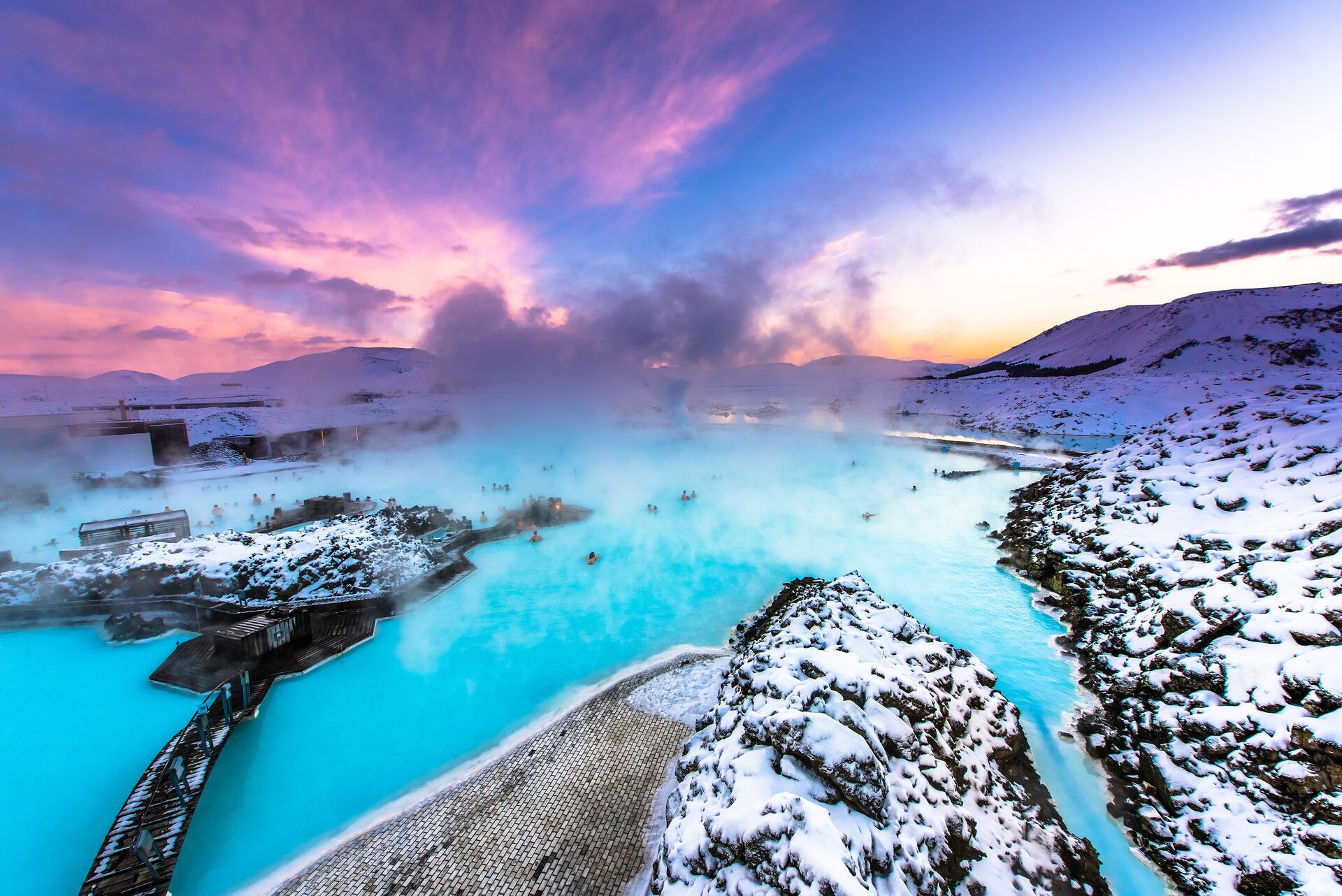 People bathing in the blue lagoon hot spring in Iceland, Europe