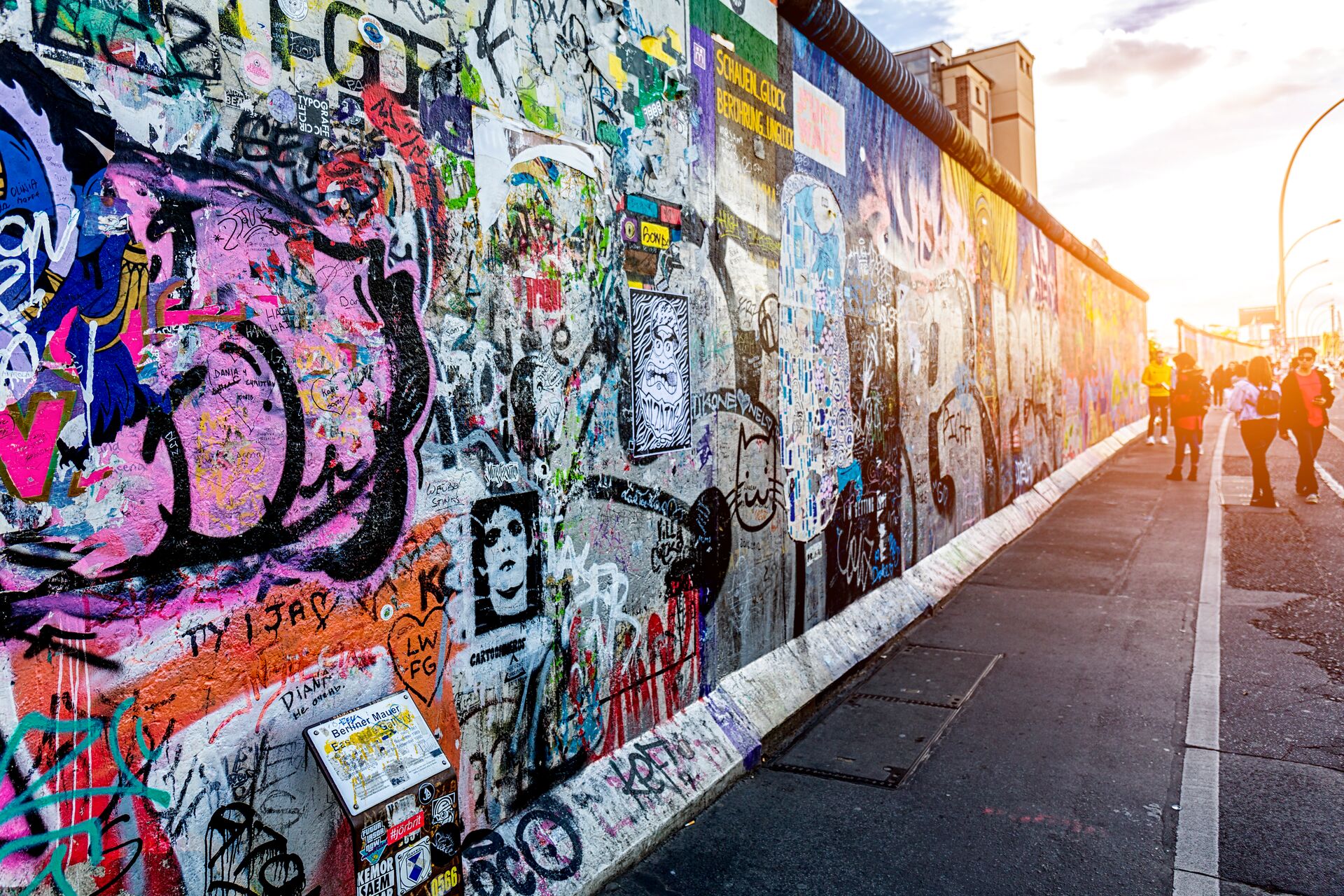 Graffiti paintings on the East Side Gallery Wall (Berliner Mauer) in Berlin, Germany