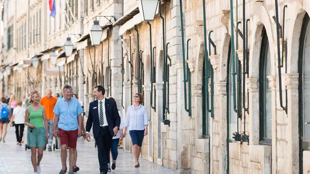 People walking on a pavement in Croatia