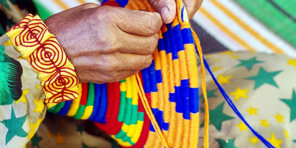 Hands of a Nubian Woman making crafts in Aswan, Egypt
