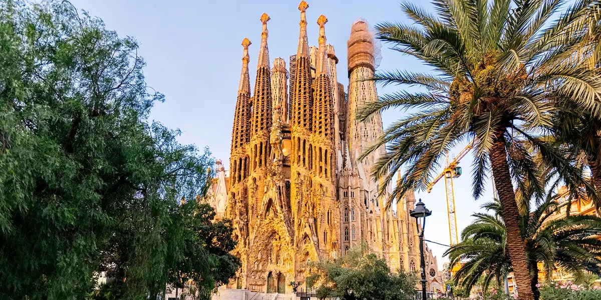A clear sky view of the Sagrada Familia Basilica in Barcelona, Spain