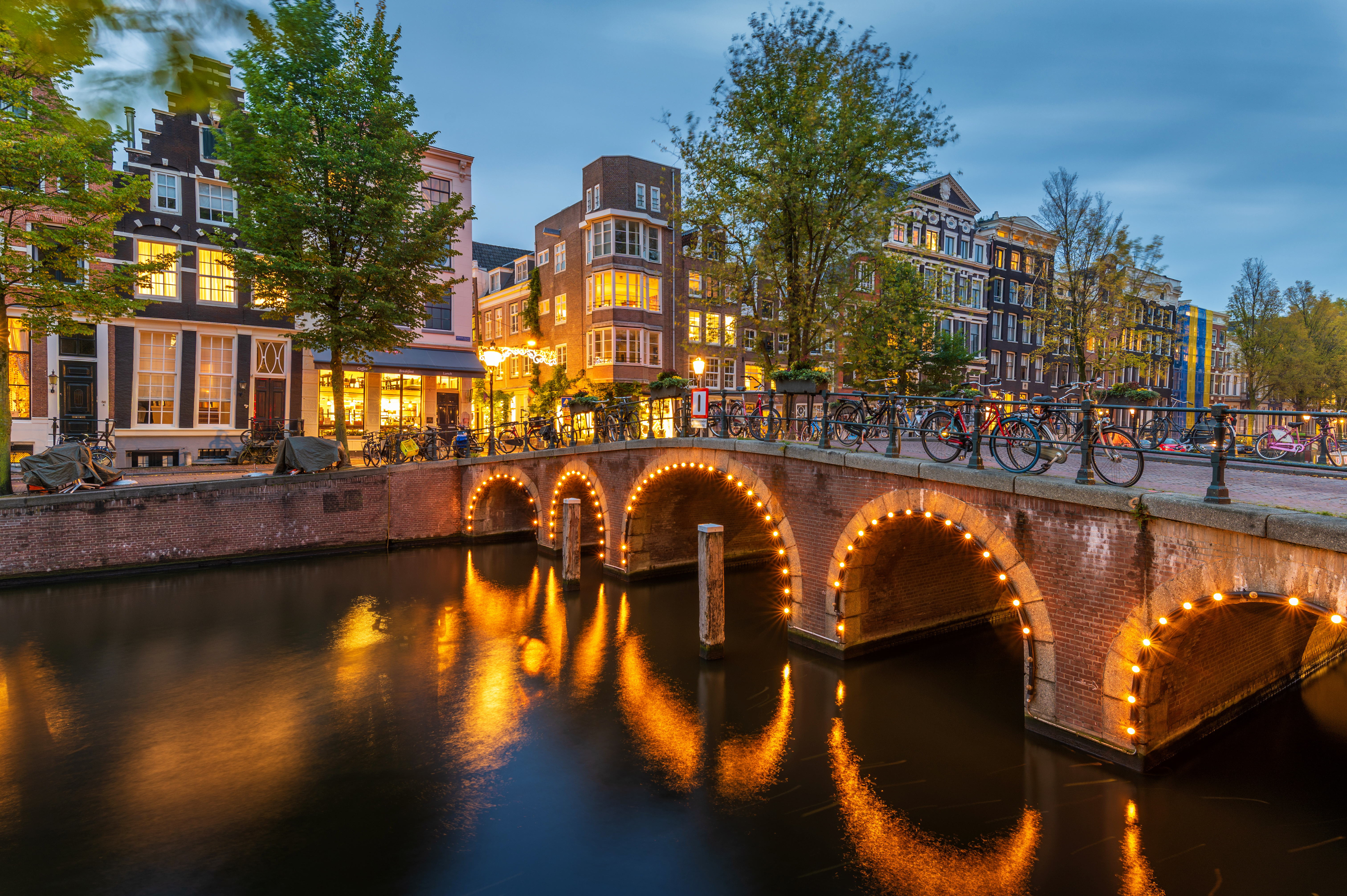 Illuminated Bridge In Amsterdam, The Netherlands At Dusk 1351065507