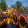 Illuminated Bridge In Amsterdam, The Netherlands At Dusk 1351065507