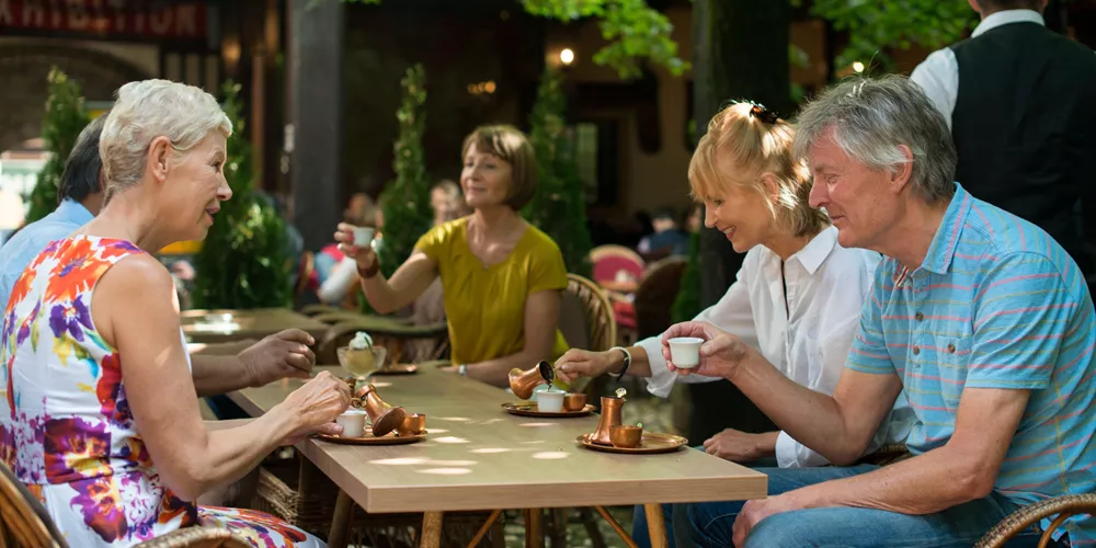 People drinking Bosnian coffee at a café in Sarajevo, Bosnia and Herzegovina