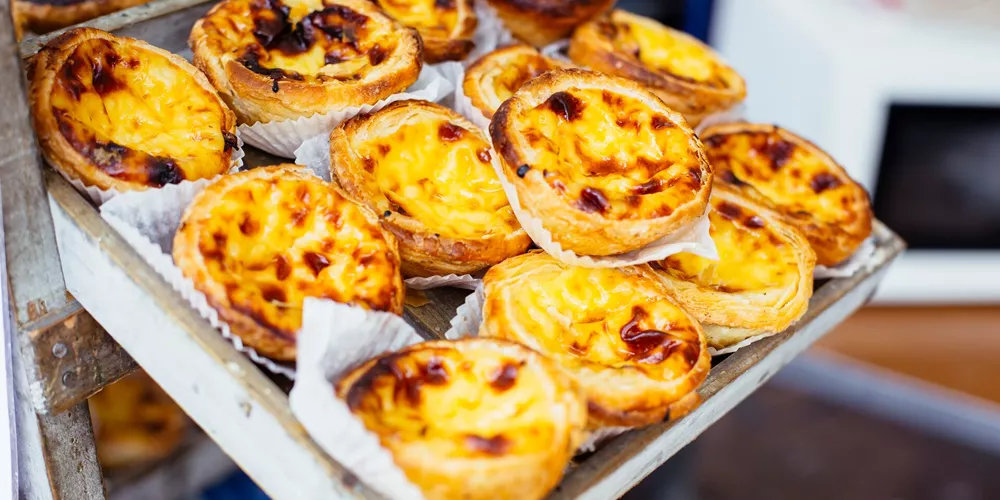 Traditional Pastel De Nata on sale in a market in Portugal