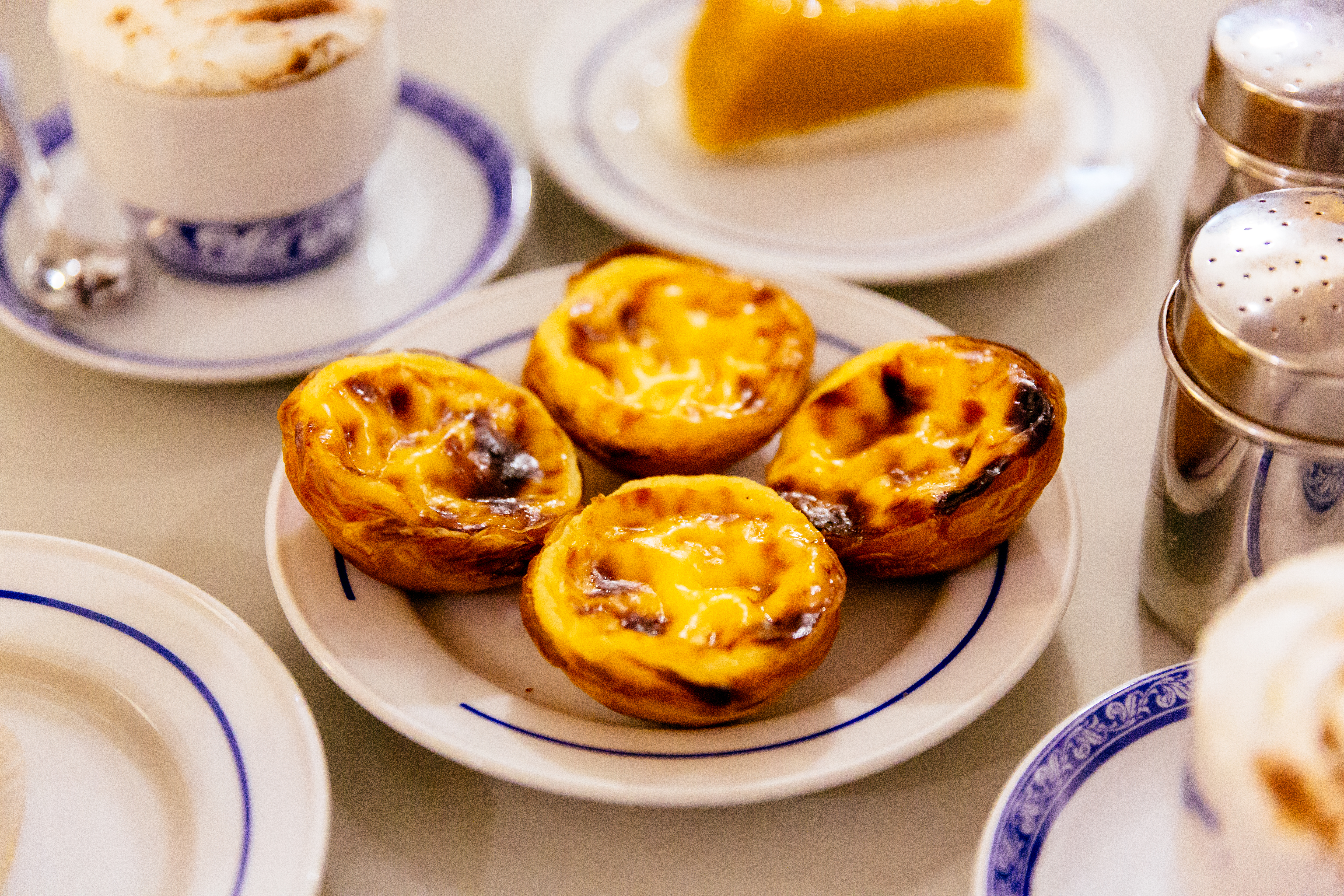 Pasteis De Nata, Traditional Portuguese Pastry On A Plate 1205109482