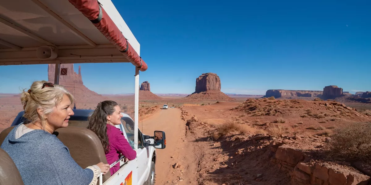 Tourists on a guided tour around Monument Valley, USA