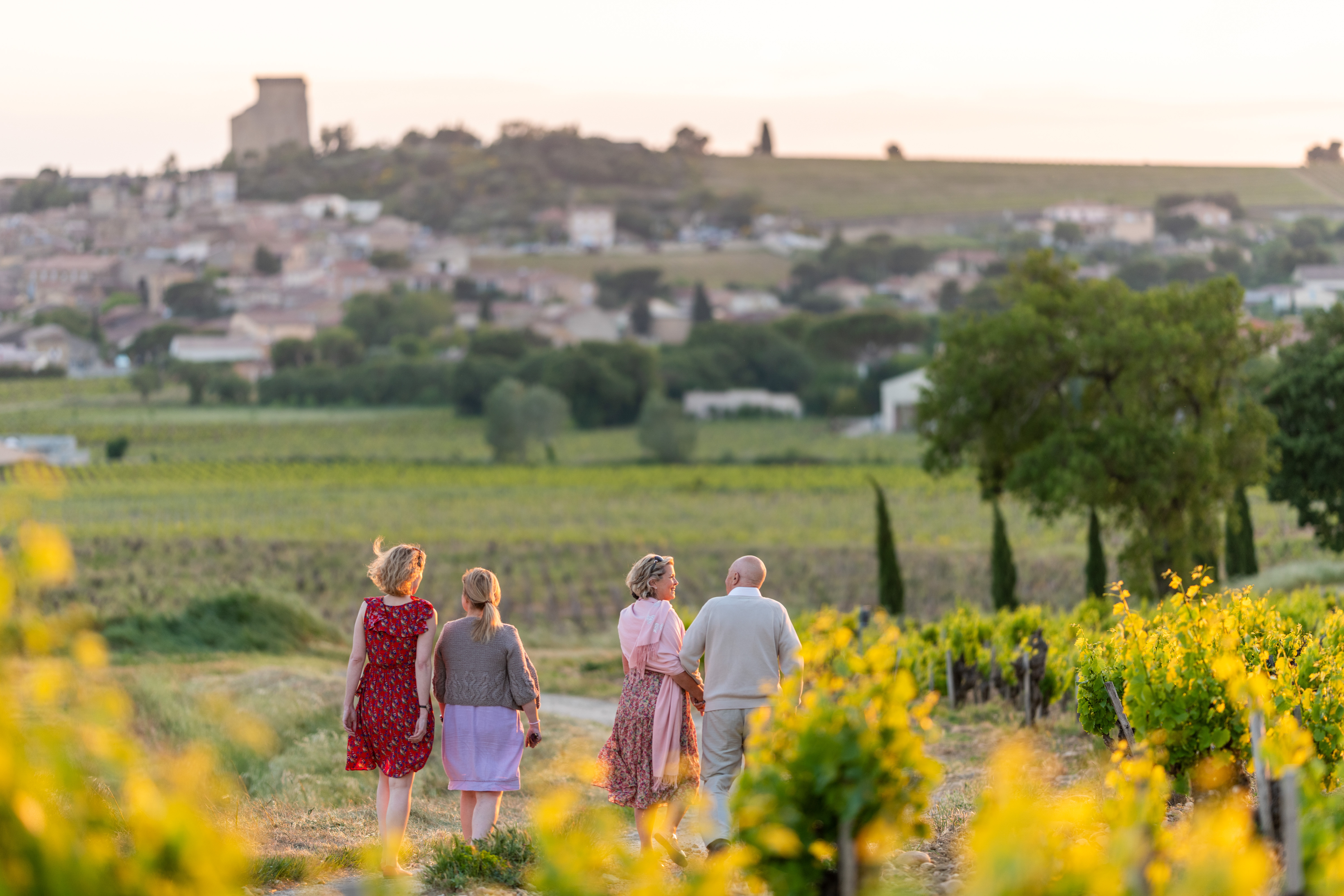 People on stairs listening to their travel director. 