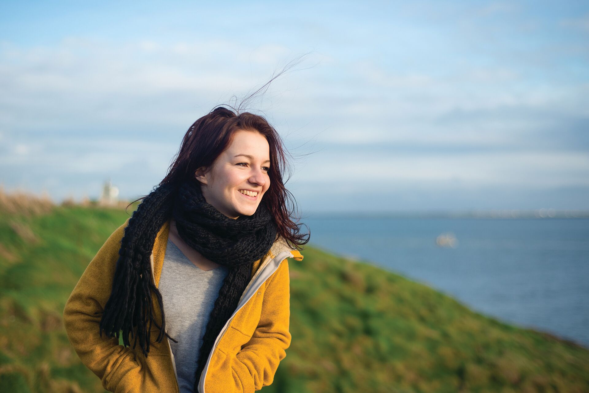 Woman smiling while on holiday in Ireland
