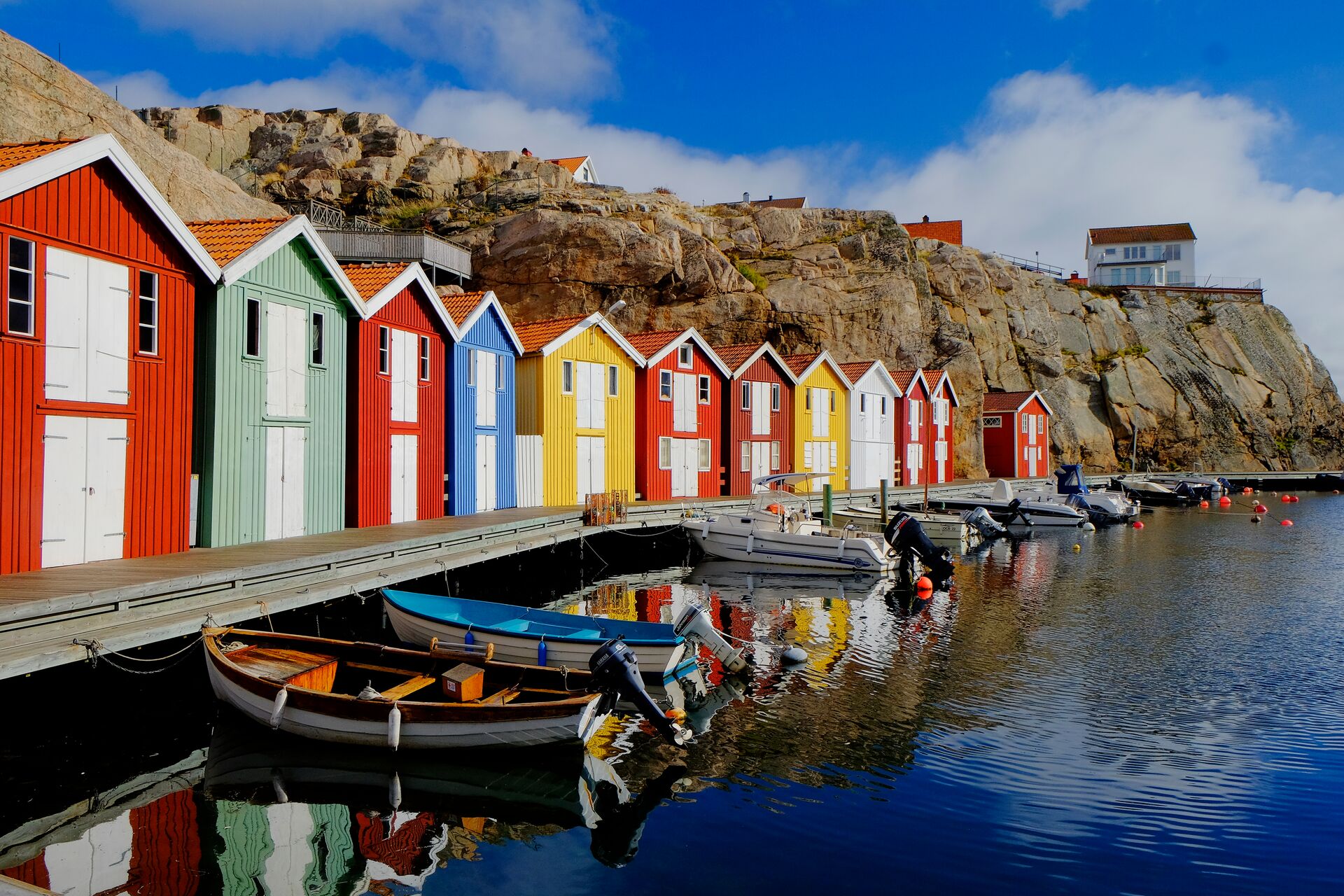 Colorful Fishing Huts At Water in Sweden