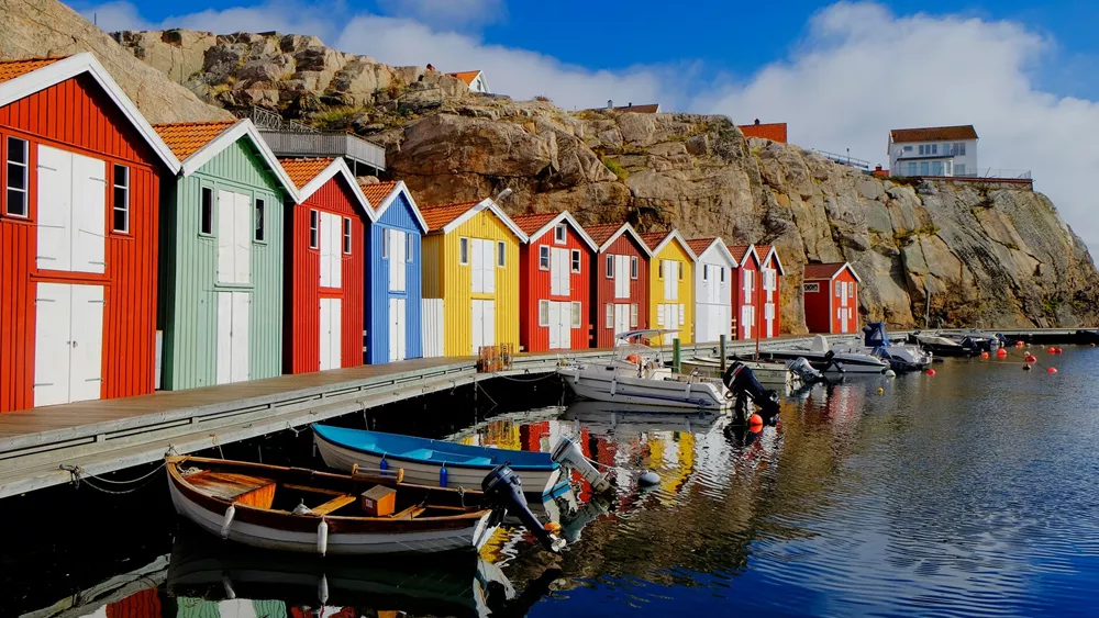 Colorful Fishing Huts At Water in Sweden