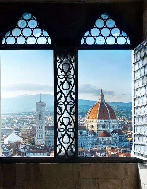 Beautiful Florence skyline through old window