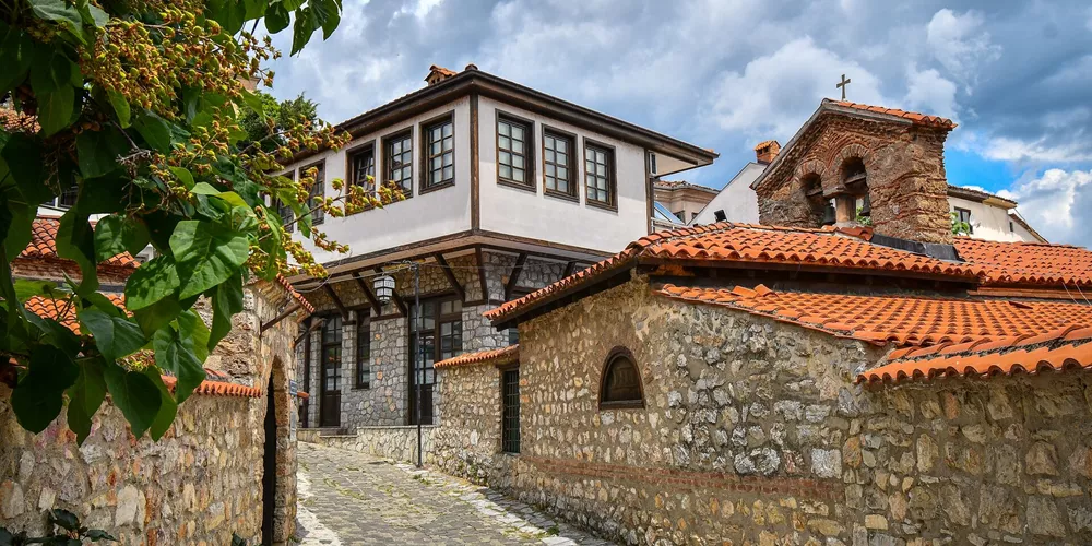 A typical narrow street in Ohrid on the border of North Macedonia and Albania in Europe