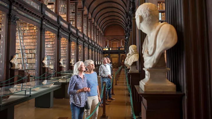 Guests enjoy their VIP entrance to the Trinity College library in Dublin, Ireland