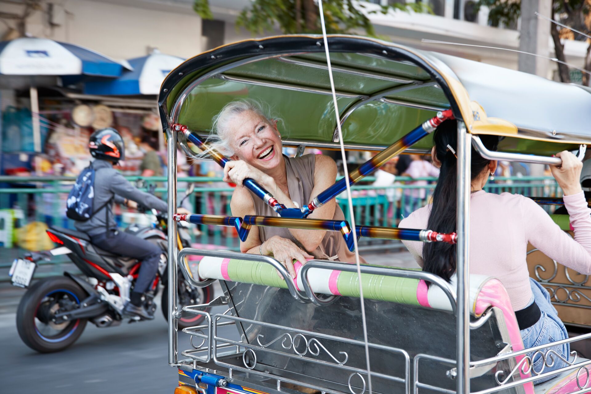 Happy Woman on a rickshaw