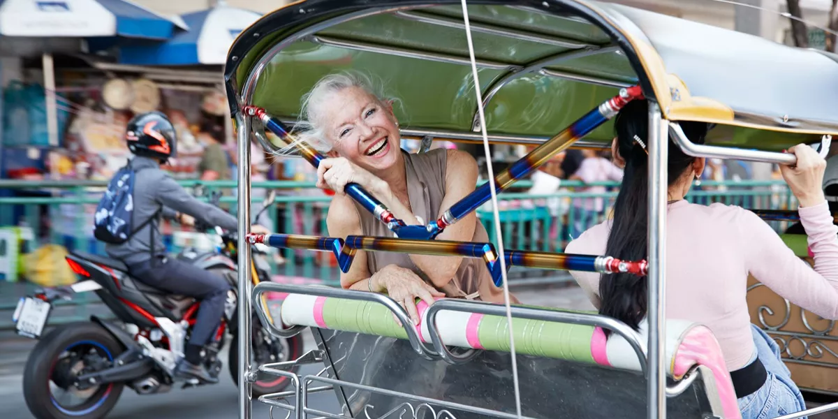 Happy Woman on a rickshaw