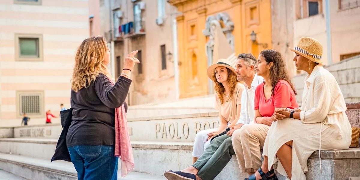 Guests joining a local expert on a MAKE TRAVEL MATTER anti-mafia walking tour in Palermo, Sicily