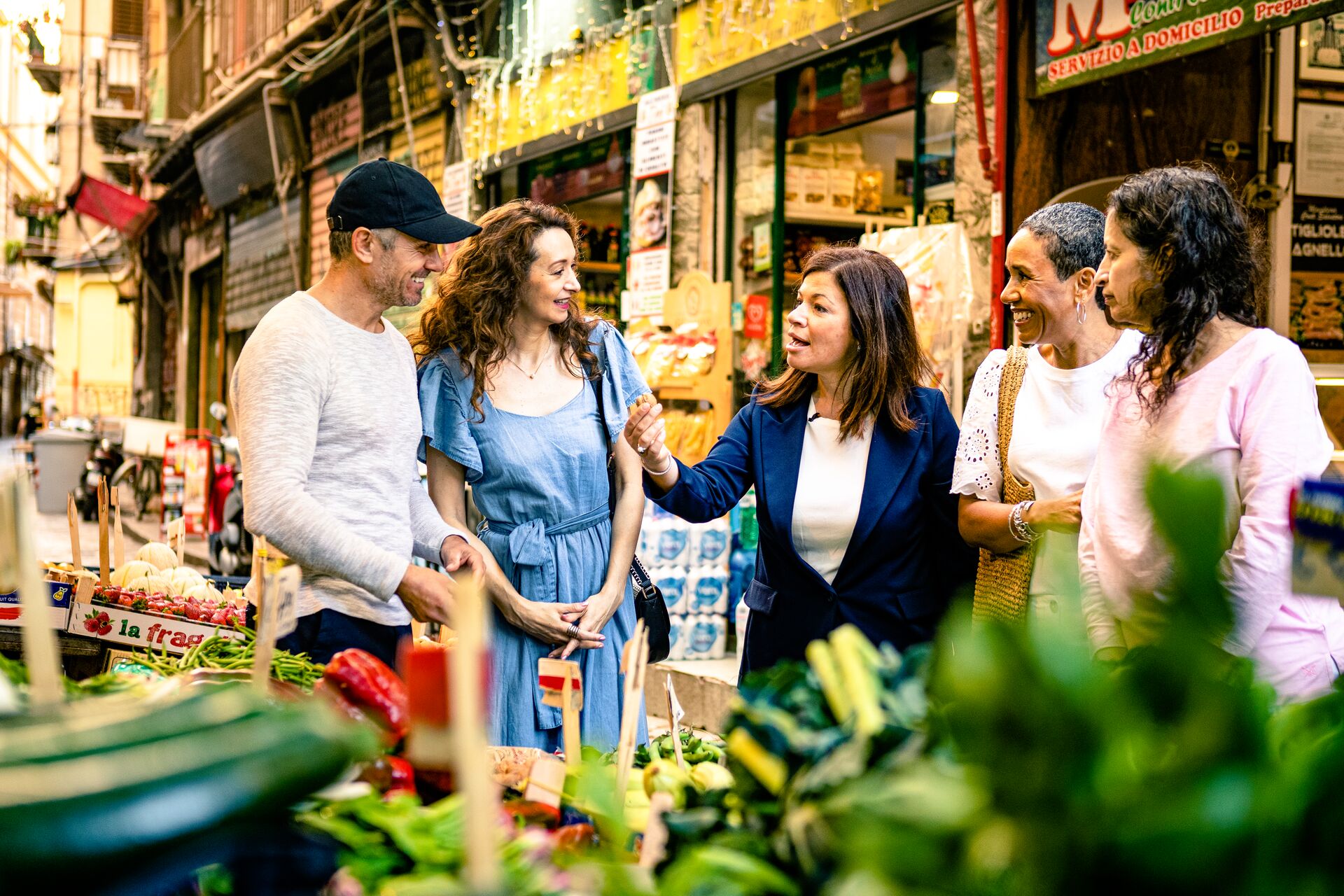 A Travel Director guides guests around Vucciria Market in Sicily