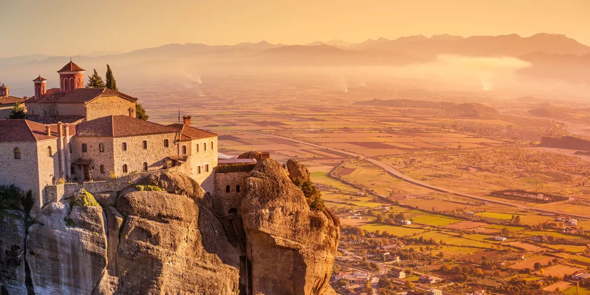 Kalambaka monastery at dusk in Meteora, Greece