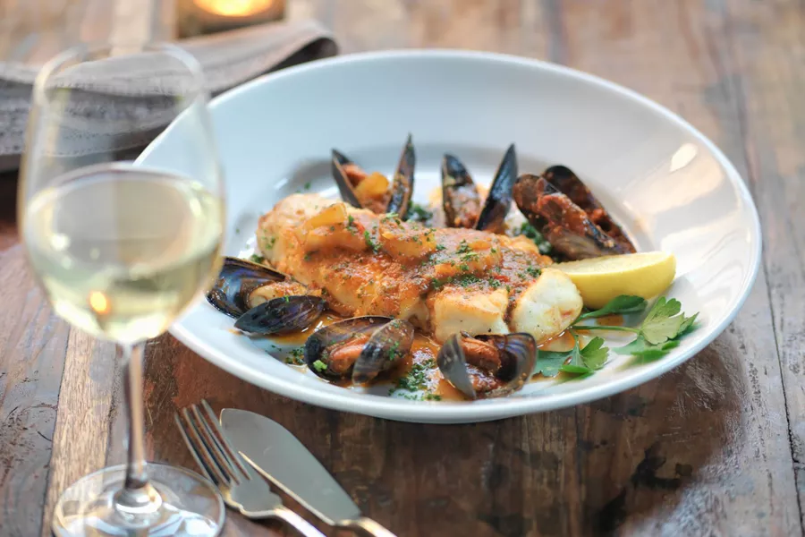 Pan Fried Halibut With Mussels, Fresh Fennel, Garlic, Chillies And Tomato Sauce