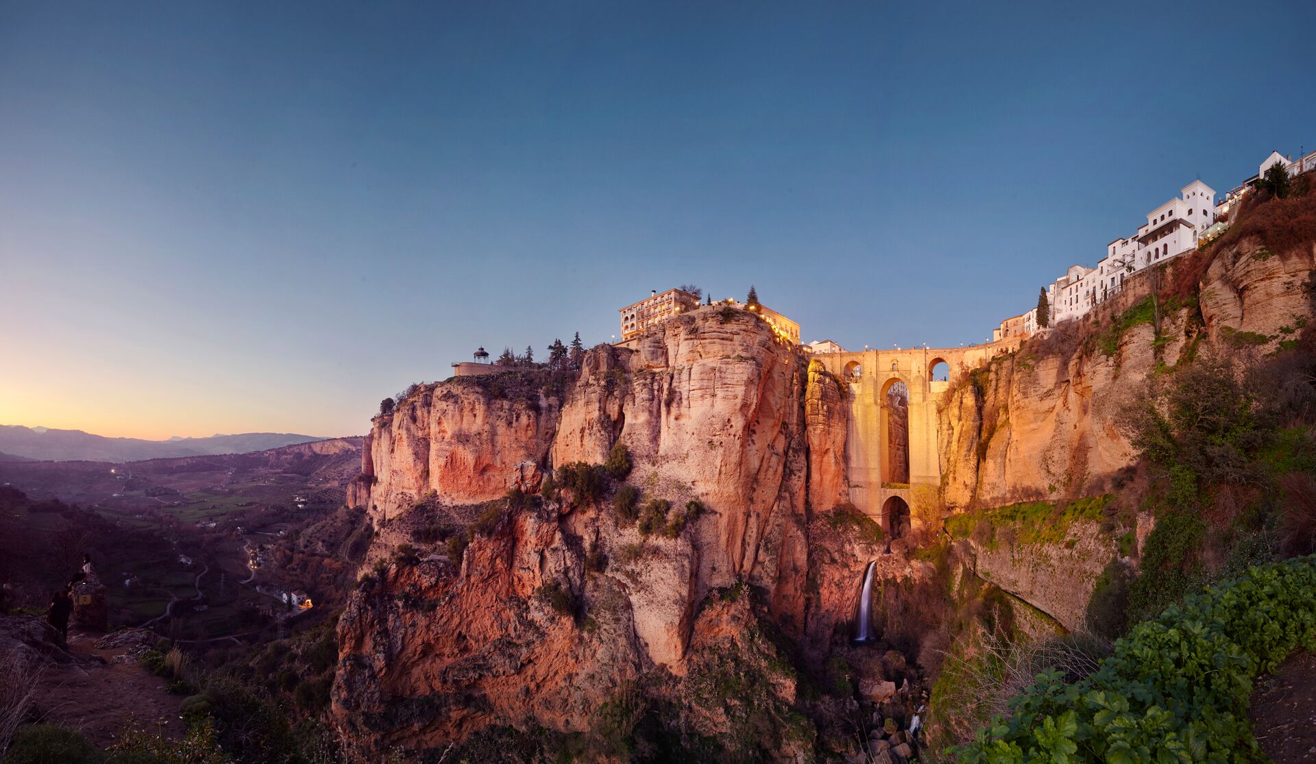 Puente Nuevo And The City Of Ronda At Dusk near Malaga, Spain