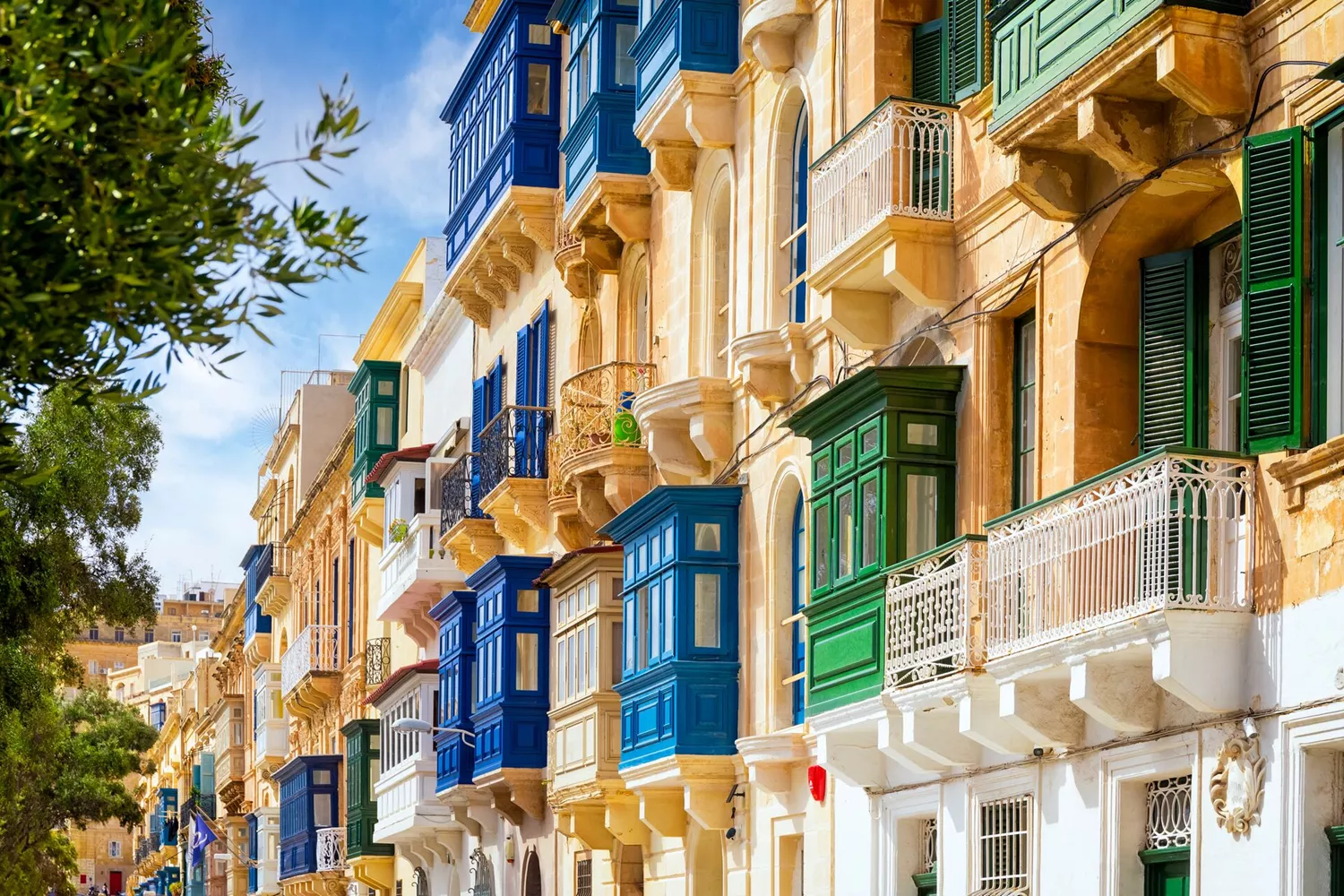 Traditional closed wooden balconies on the streets of Valletta, Malta