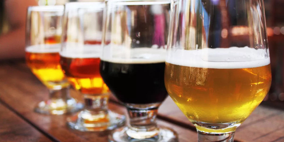 Beer flight Of four beers In glasses during a beer tasting