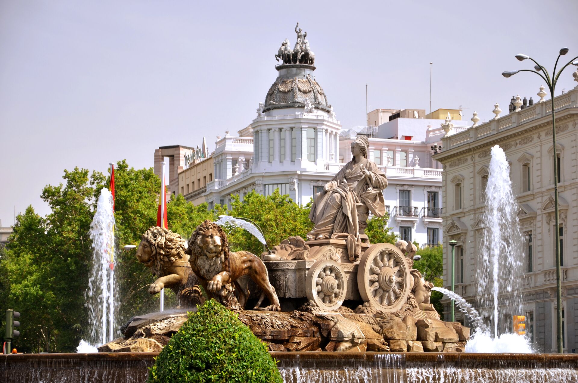 Cibeles Fountain On Plaza De Cibeles in Madrid, Spain with the Prado Museum in the background