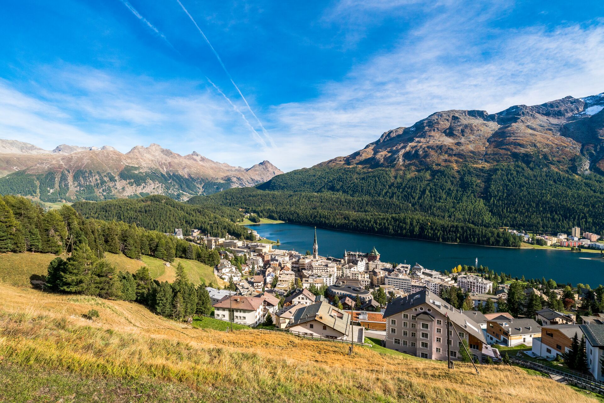 St Moritz village and lake in summer, Switzerland on a sunny day