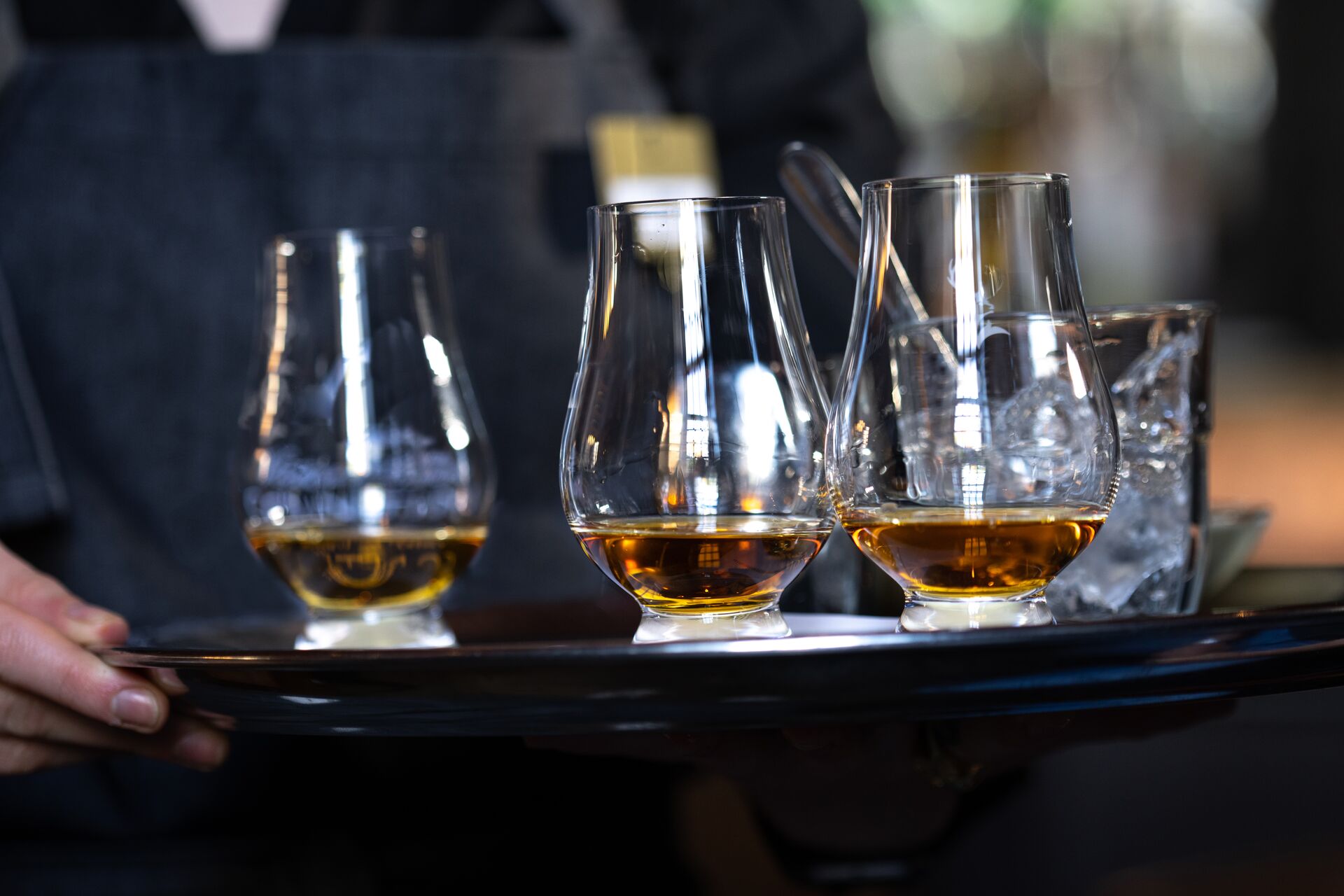 Whisky being delivered on a tray