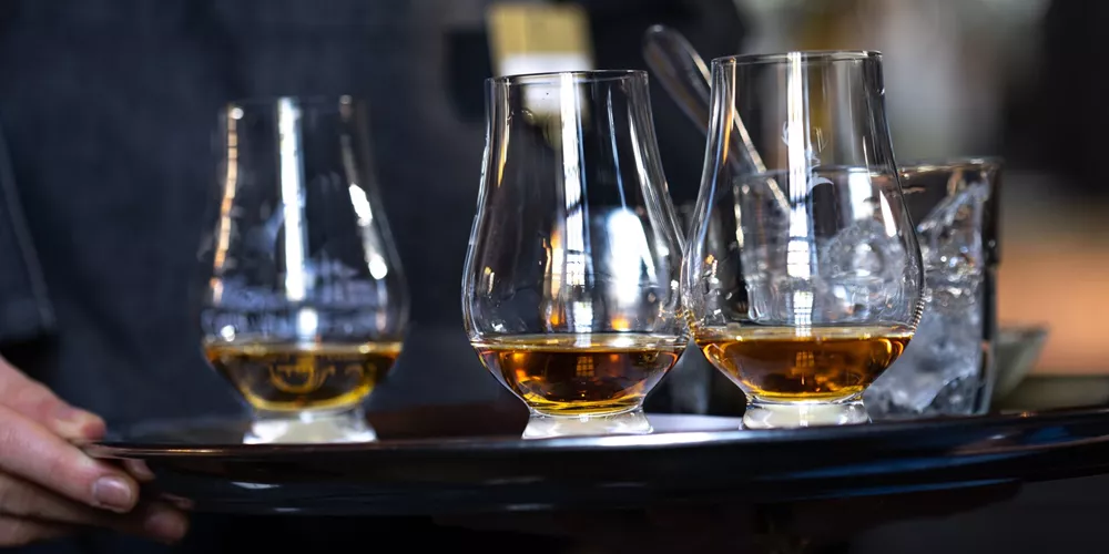 Whisky being delivered on a tray