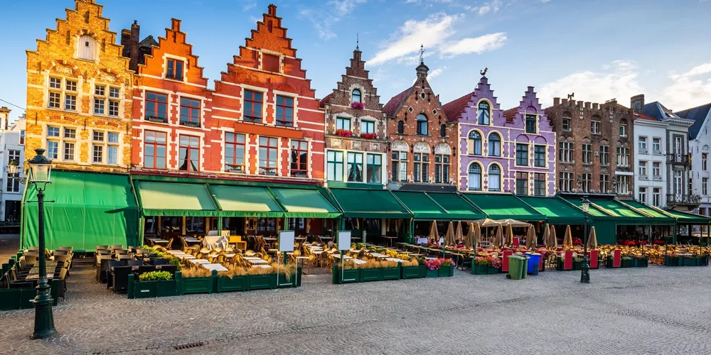 Restaurants in the main square of Bruges, Belgium