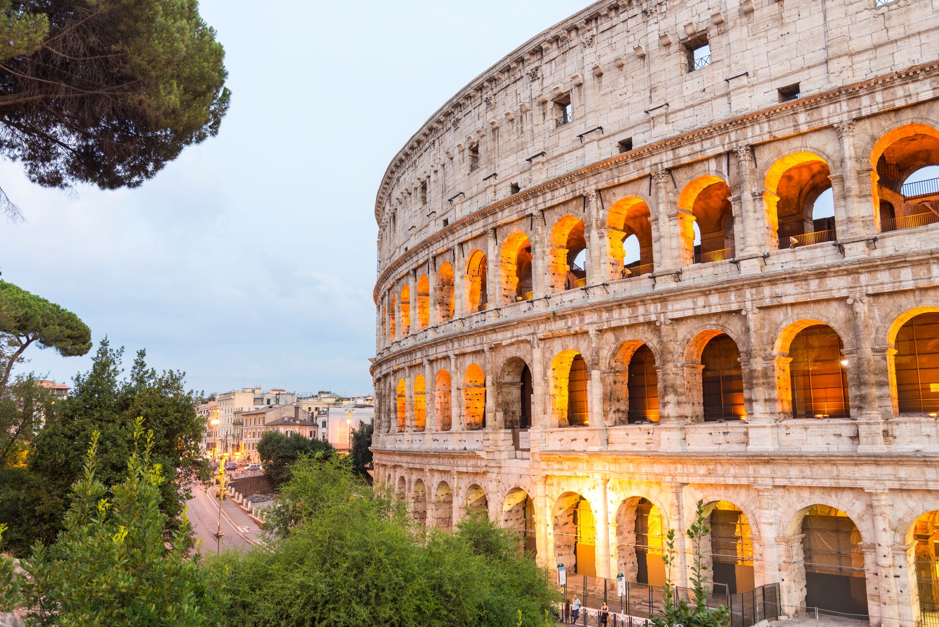 The Colosseum in Rome, Italy lit up at dusk