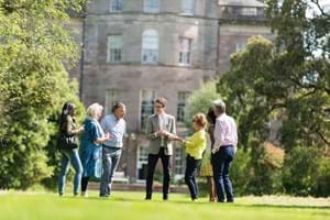 Sir Ludo in the Ardgowan gardens with guests, Ardgowan House, Scotland