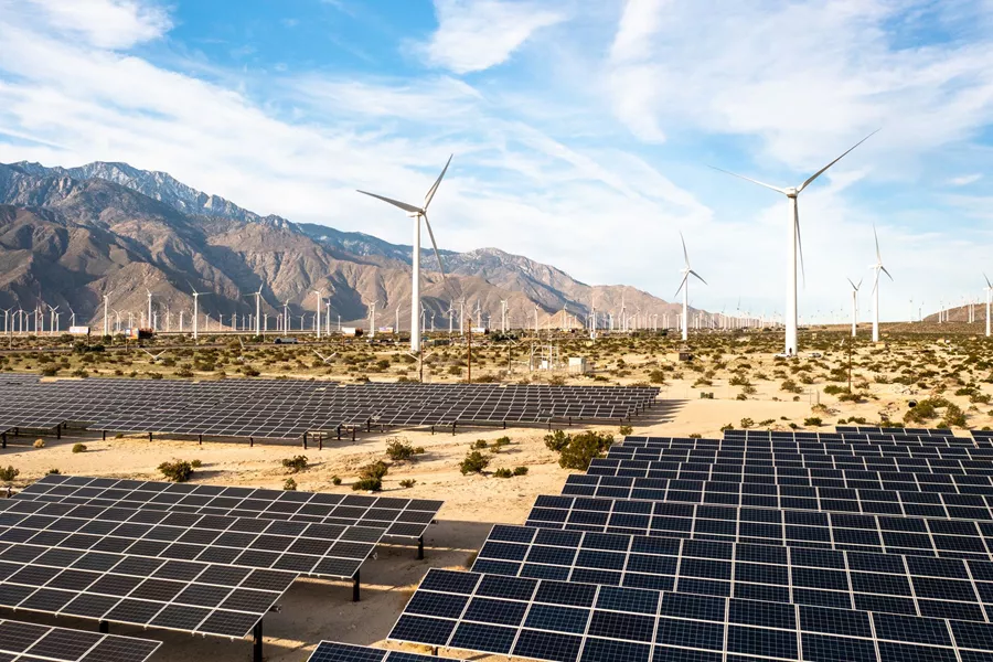 Large Aerial View Over Solar Panels And Windmills 1367402534