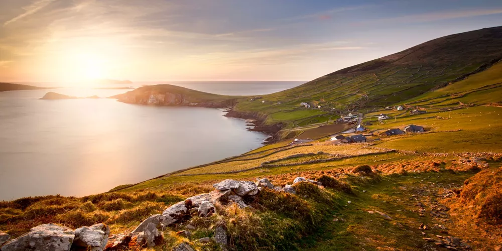 Coumeenole Beach at sunset on Slea Head Drive in Dingle, County Kerry, Ireland