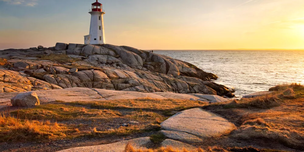 Peggy's Cove lighthouse at sunset