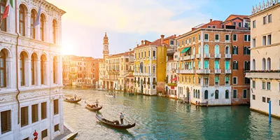 Gondaliers at Sunset in Venice, Italy