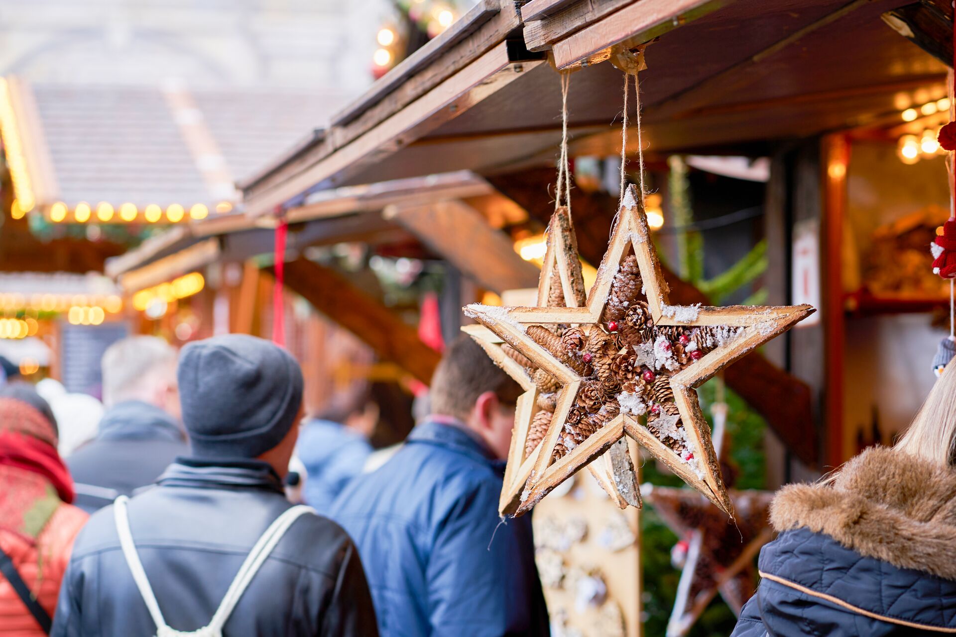 Large traditional star hanging up at a German Christmas Market