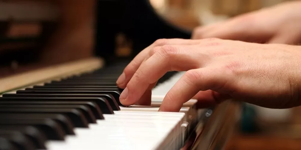 Person playing the piano