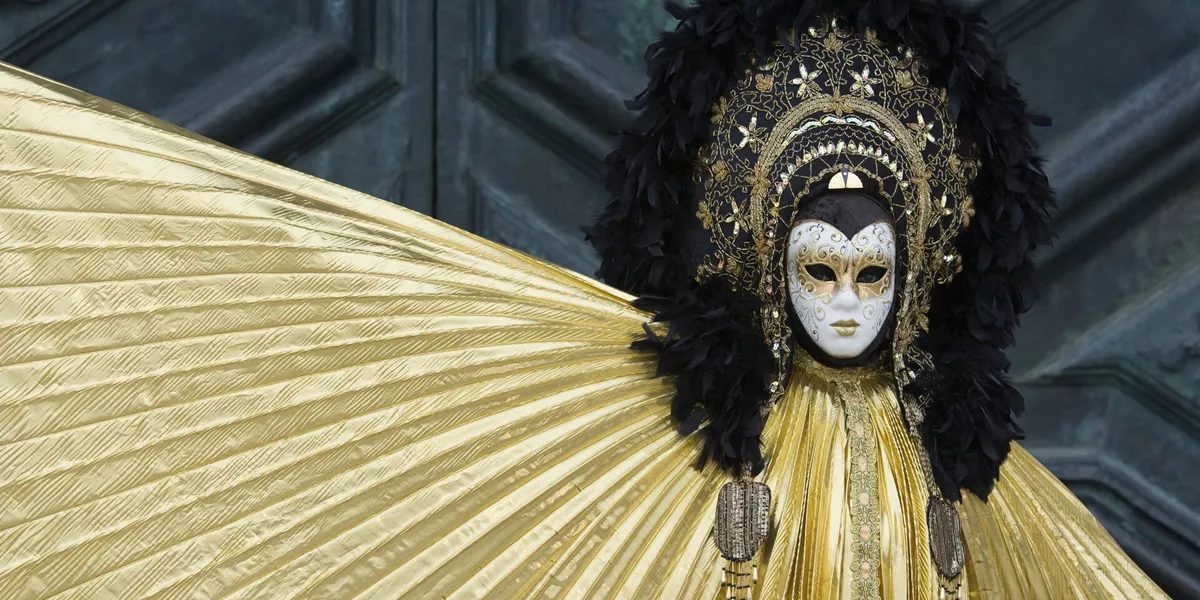 Mystic Female Mask At Carnival In Venice, Italy