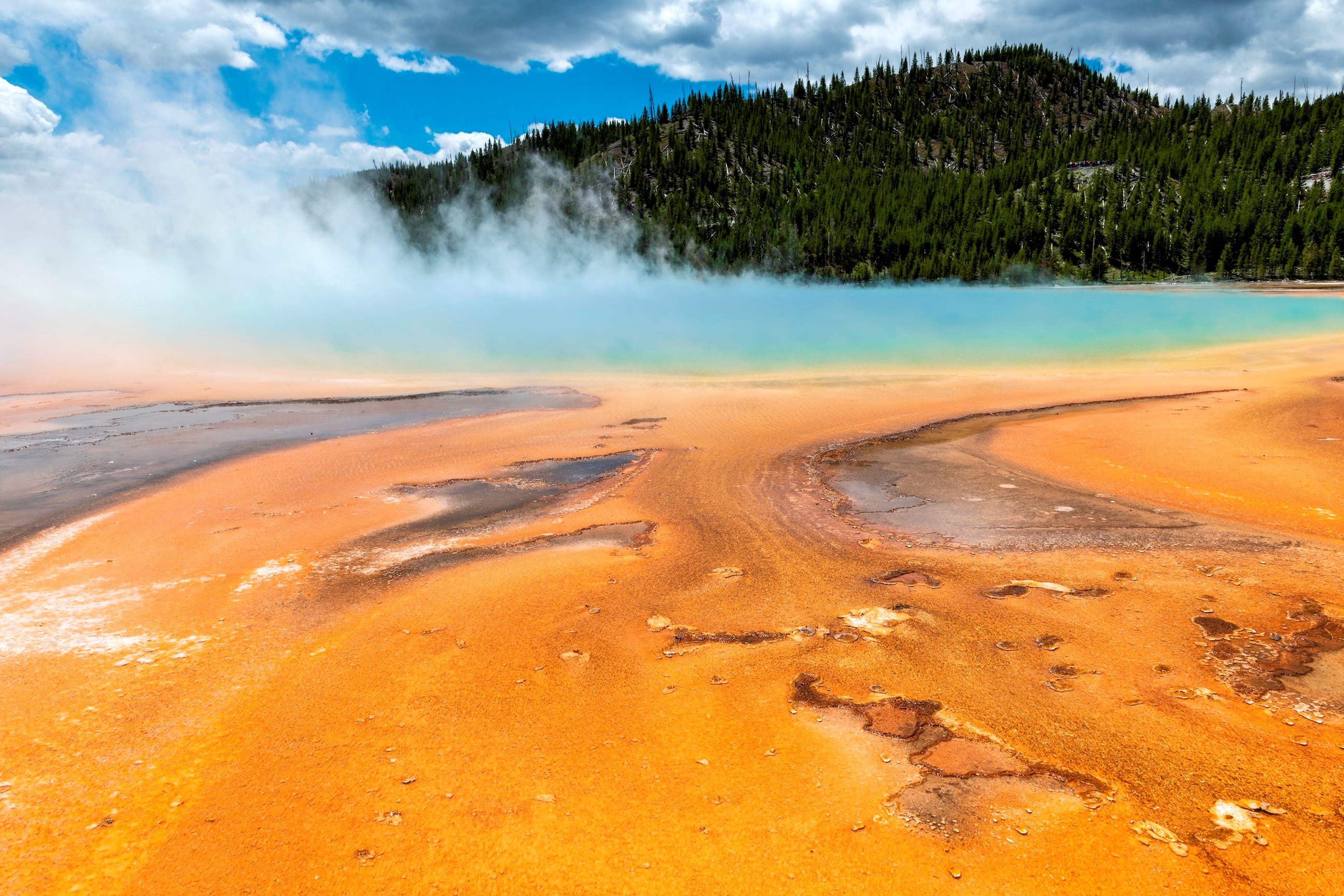 Close up shot of a grand prismatic spring in Yellowstone National Park, USA
