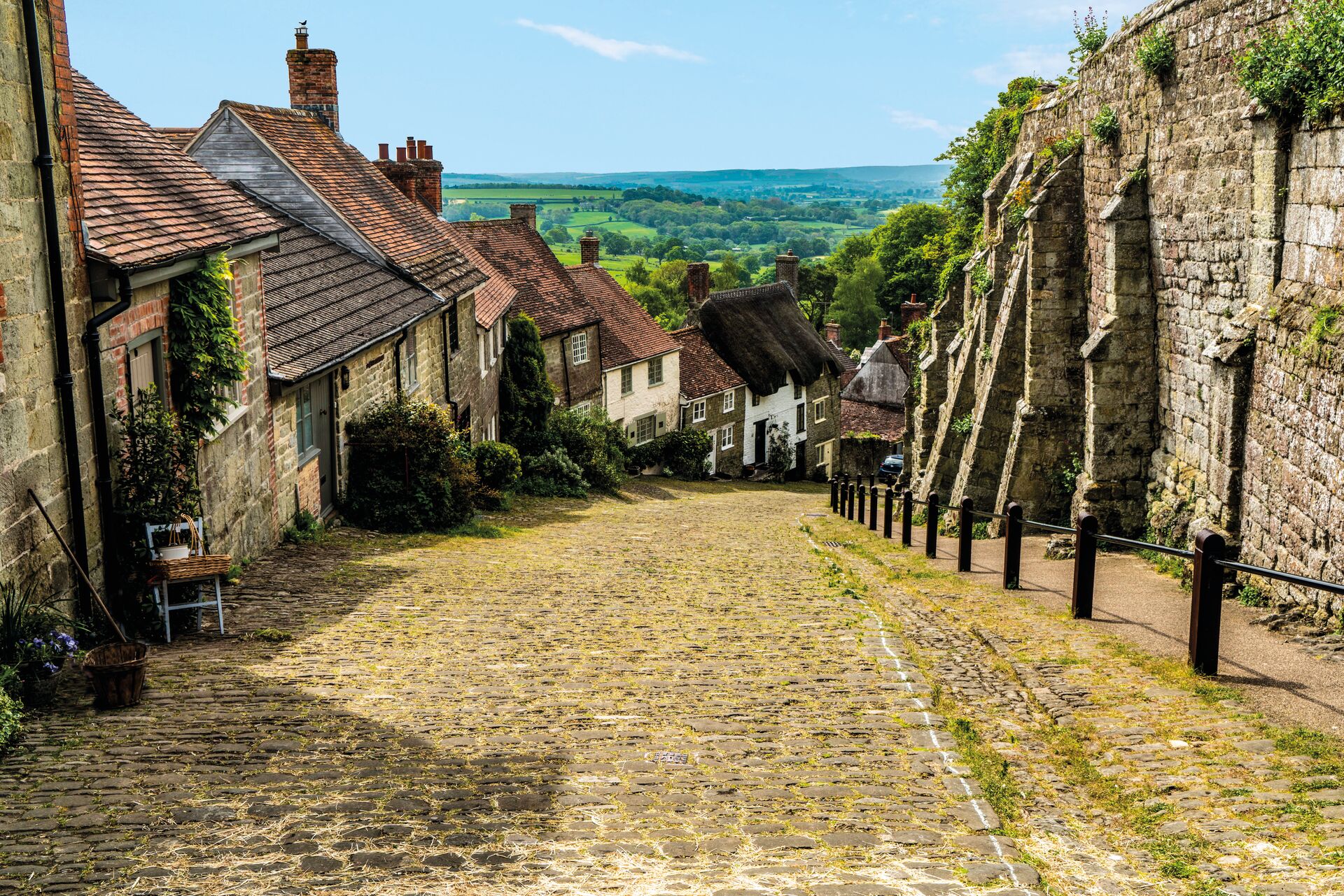 Footpath leading to hills, sea and sky