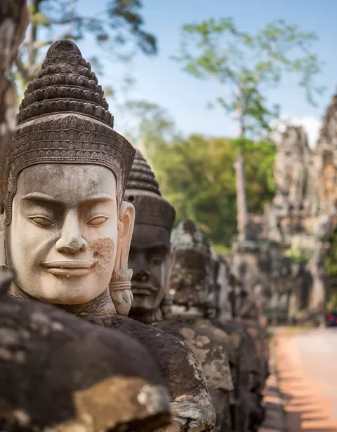 Buddhist Head Statue at Angkor Wat Temple in Cambodia