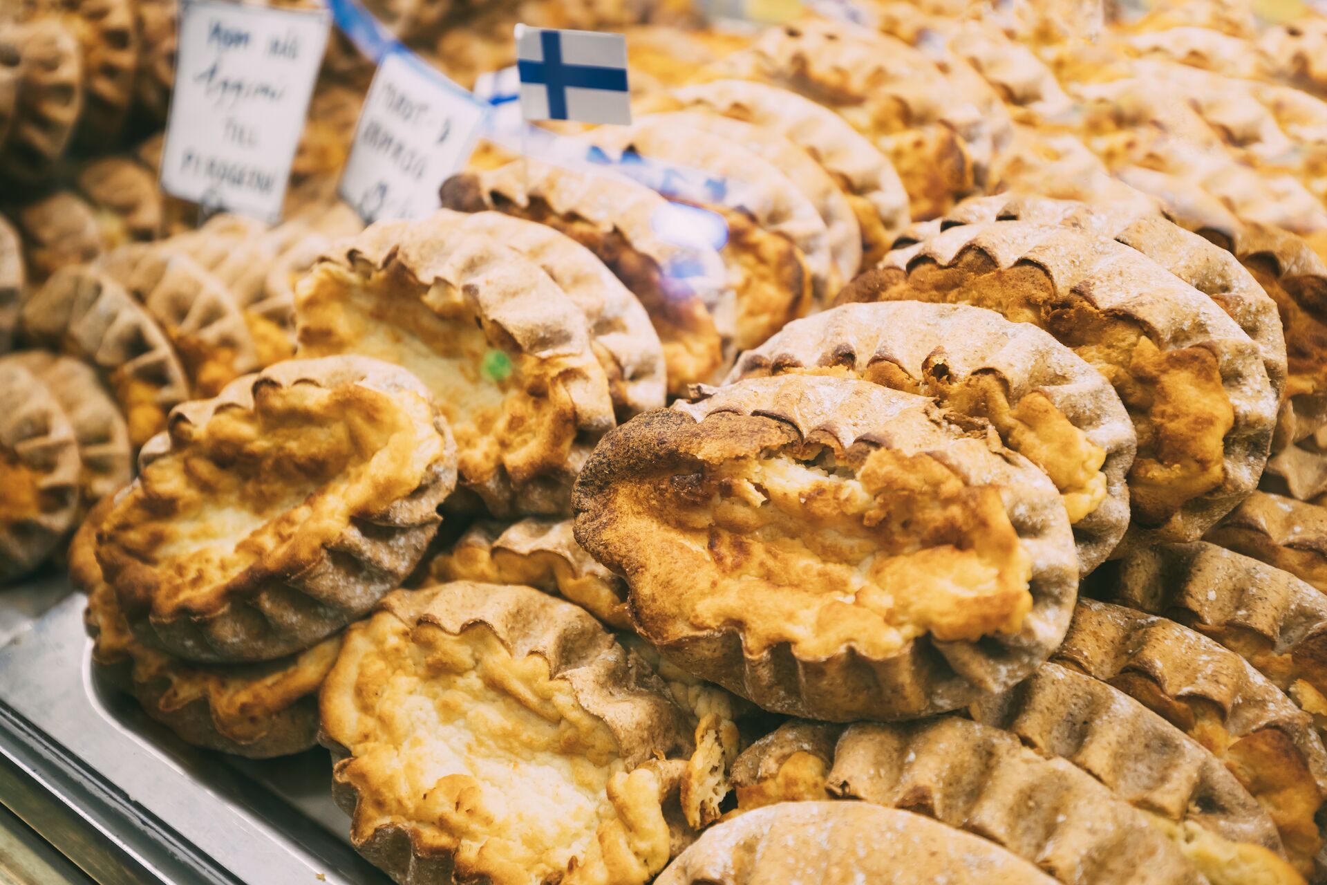 Large Finnish Traditional Pasties Or Pirogs Karelian Pasties, Karelian Pies Or Karelian Pirogs From Region Of Karelia Rustic Homemade Bread 1180738087