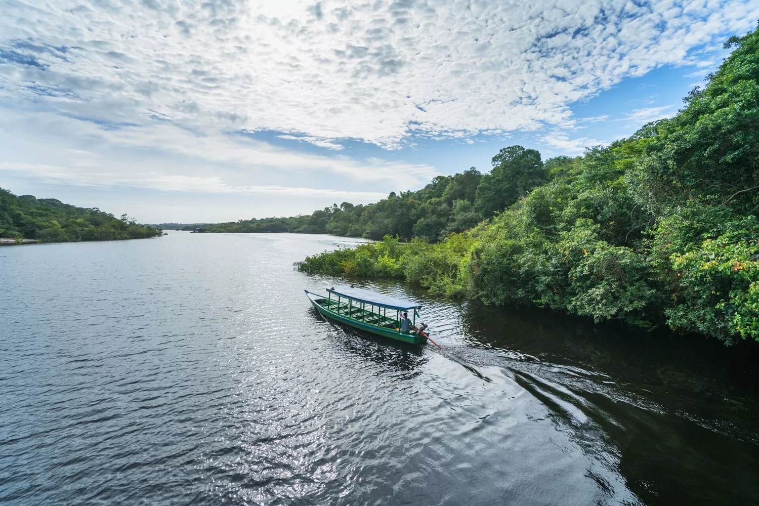 Boat on the tributary of the river Rio Negro in Brazil