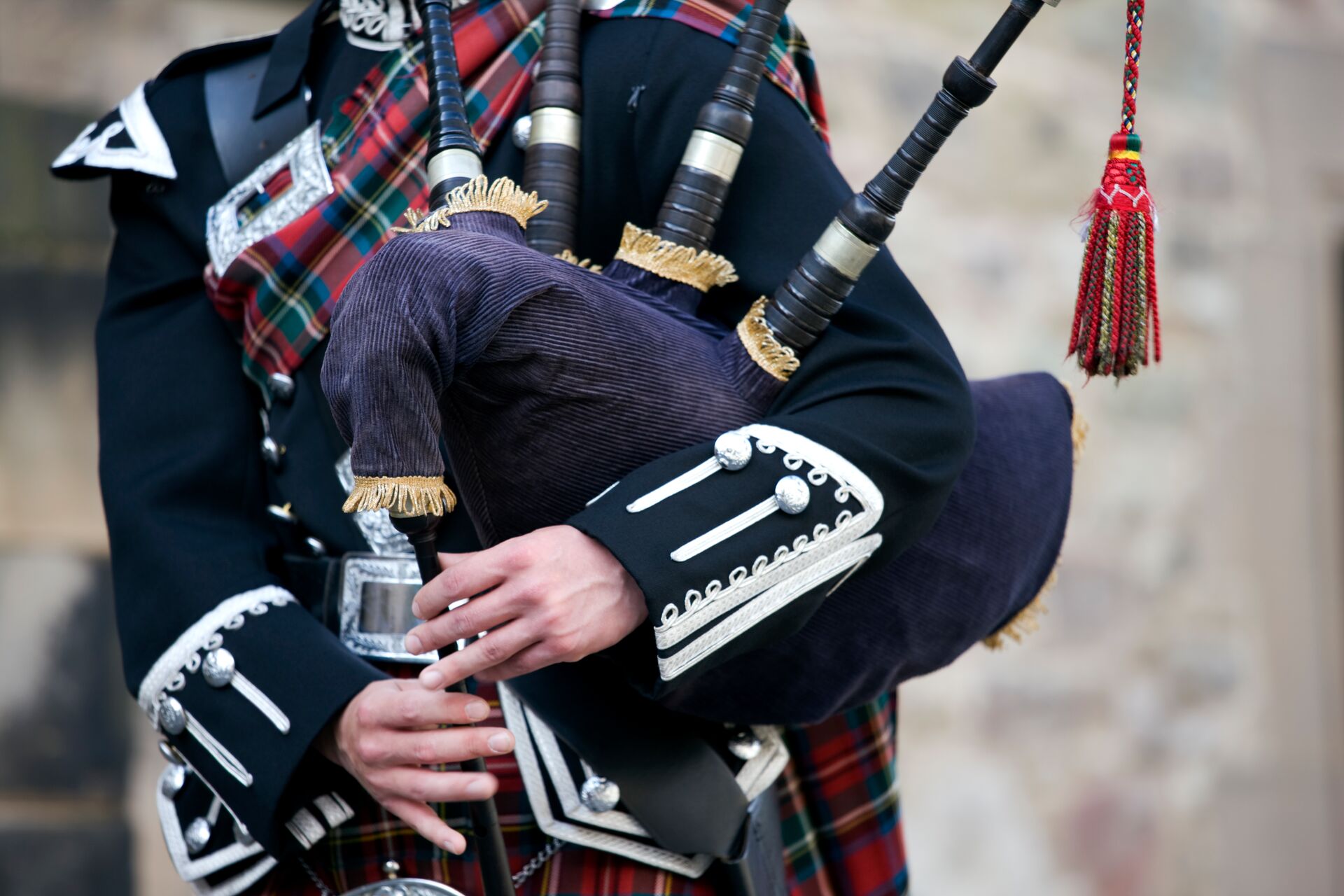 Large Close Up Mid Section Of A Man Playing The Scottish Bagpipes 182174480