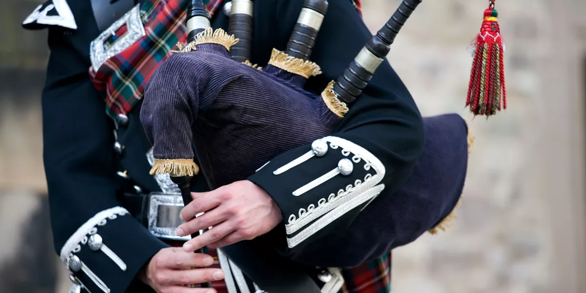 Large Close Up Mid Section Of A Man Playing The Scottish Bagpipes 182174480