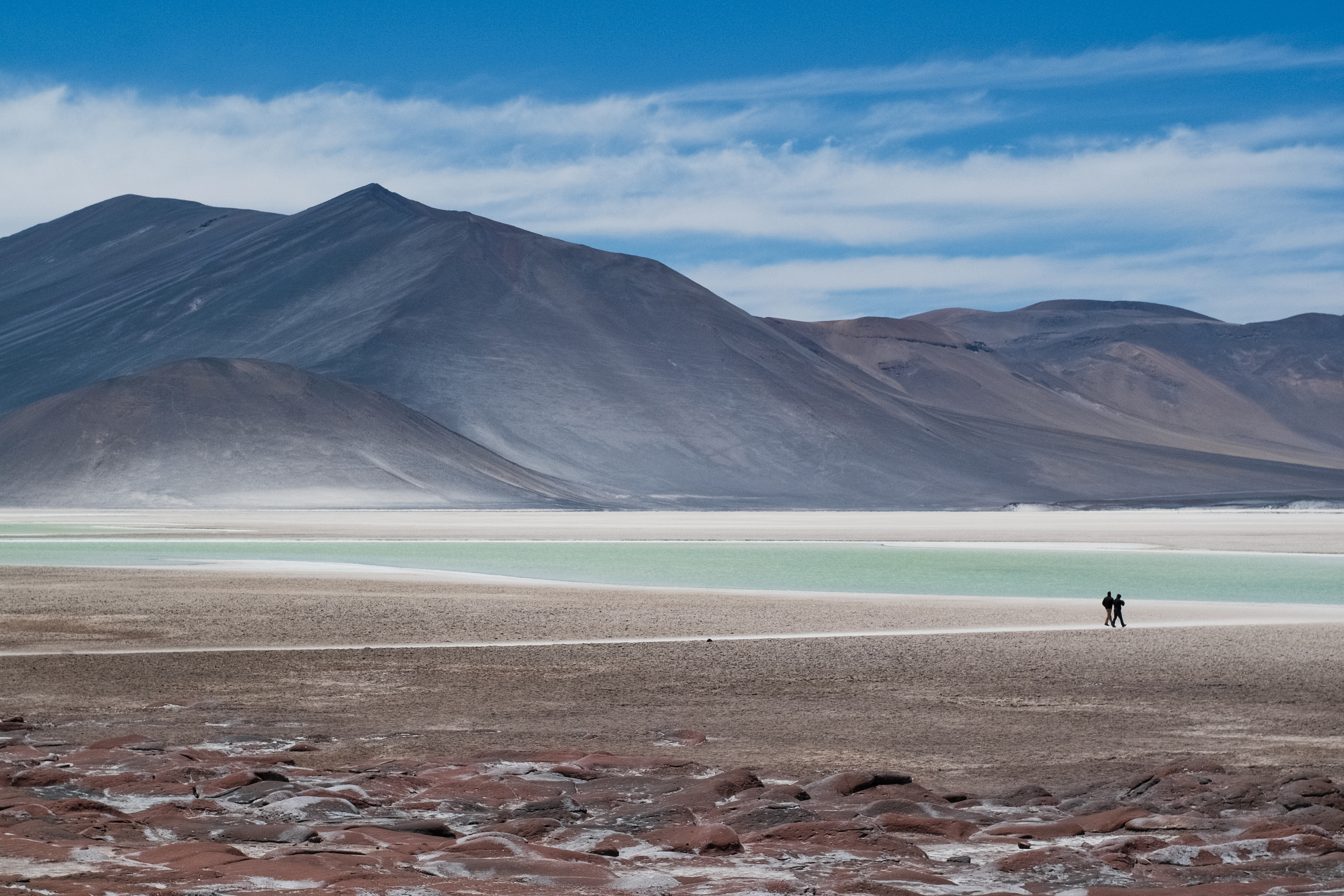 Silhouette Of Two People By Lakes At Piedra Rojas On Altiplano In Atacama Desert, Chile 1341435613