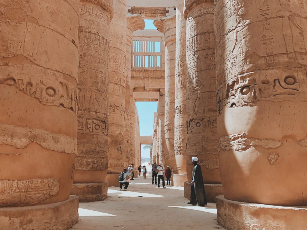 tourists and locals inside the Luxor temple